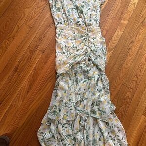 A beautiful summer dress. 100%silk! Almost new. Worn once